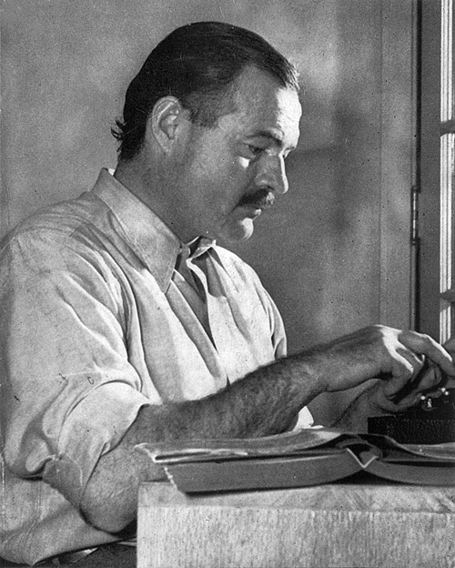 ernest hemingway black and white portrait typing