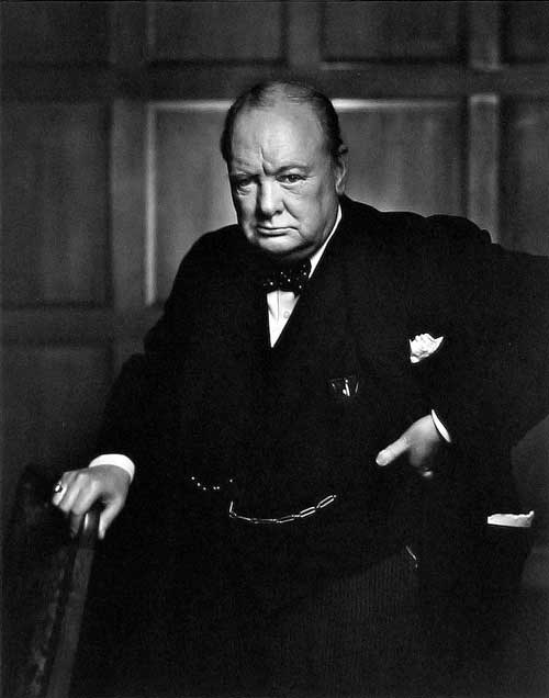 winston churchill black and white karsh walking stick hand on waist bow tie glaring determination