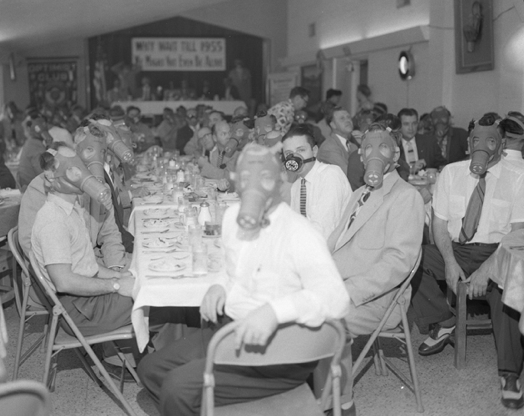 los angeles smog masks seated men at lunch black and white 1954 via servetolead.com